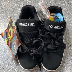 Brand new, never worn, kids Heelys wheeled shoes, size youth 4